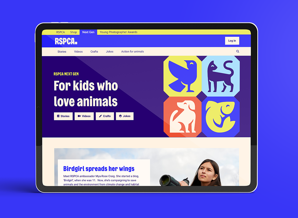 A tablet displaying a colorful website for the RSPCA (Royal Society for the Prevention of Cruelty to Animals). The website features the tagline 'For kids who love animals' and includes various animal-themed icons and images. The tablet is set against a vibrant blue background.